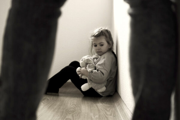 Child,Abuse,Concept.,Mistreated,Little,Girl,Seating,On,The,Floor