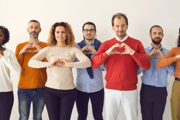 Studio,Group,Portrait,Of,Thankful,Youth,And,Senior,Citizens,Sending